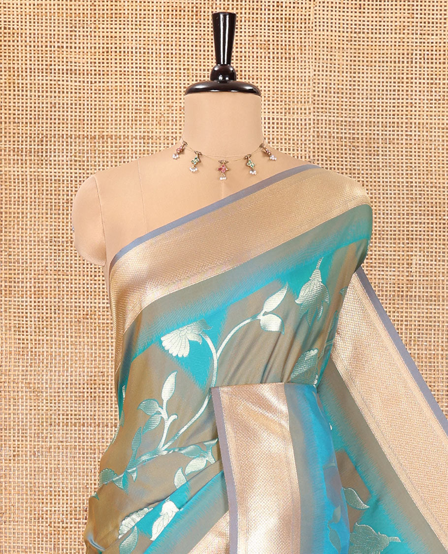 Blue Mulberry Soft Silk Saree, Embellished with Zig-Zag Stripes and Floral Jaal Design on Its Body, Highlighted by a Zari-Decked-Up Border, Pallu Features an Ikkat Design Weave, and Paired with a Blouse