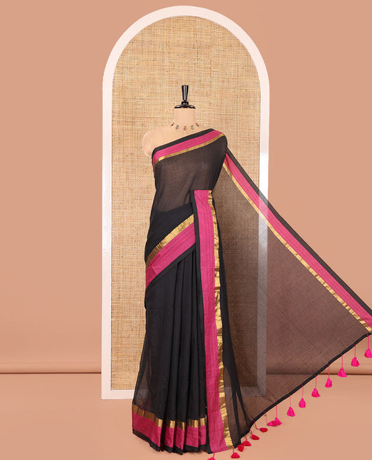 Black Plain Khadi Mul Cotton Saree, Complemented by a Contrast Pink Zari Border, Plain Pallu, and Paired with a Matching Blouse