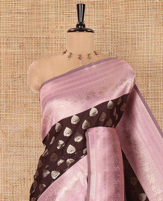 Brown and Pink Kanchi Silk Saree, Spotlighted with Zari Buttas All Over Its Body, Complemented by a Contrast Traditional Zari Border of Peacock Designs, an Intricately Designed Pallu, and Paired with a Contrast Blouse