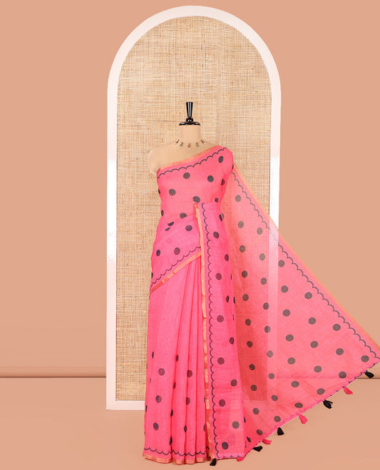 Pink Linen Cotton Saree, Beautified with Polka Dots All Over Its Body, Subtle Piping Border, Self-Pallu, and Paired with a Floral Printed Matching Blouse