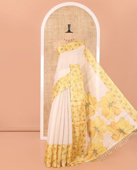 Cream Plain Tissue Saree, Artfully Designed with Contrast Floral Printed Border, Pallu Steeped with Flower Motifs Print, and Paired with a Contrast Blouse