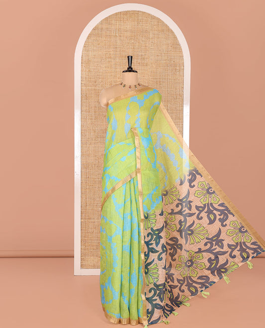 Parrot Green Linen Cotton Saree, Adorned with Shibori Print On Its Body, Subtle Piping Border, Pallu Steeped with Floral Vine Print, and Paired with a Printed Blouse