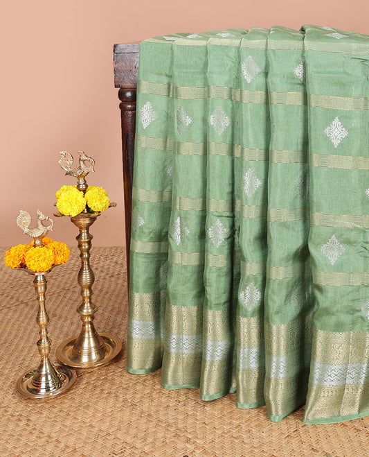 Pista green owven butta , stripes dola silk saree with zari border & chit pallu along with contrast blouse