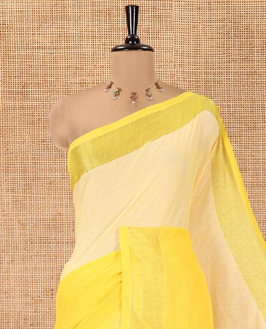 Yellow Khadi Mul Cotton Saree, Adorned with Half-And-Half-Style Double-Colour Dyed on Its Body, a Subtle Zari Border, Striped Pallu, and Paired with a Matching Blouse