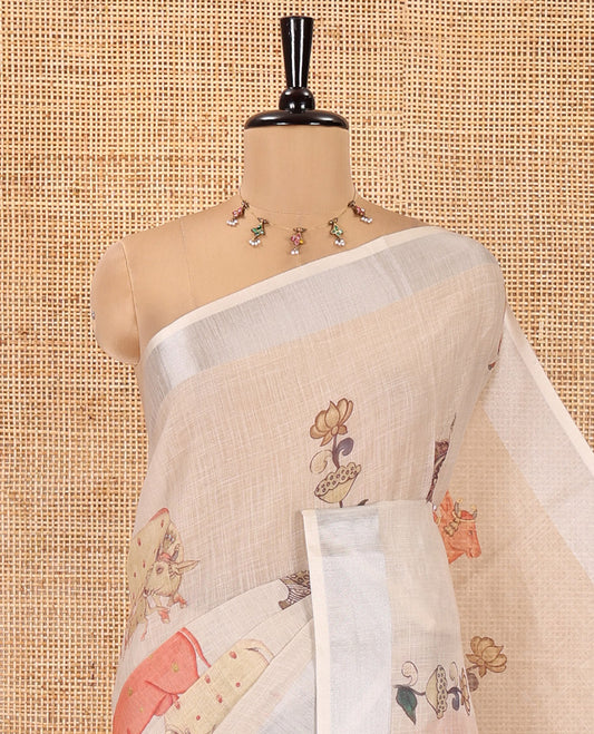 Cream Linen Saree Features Ancient Human Figurines, Floral, and Pichwai Cow, a Zari Border, Kalamkari Pallu, and Matching Blouse