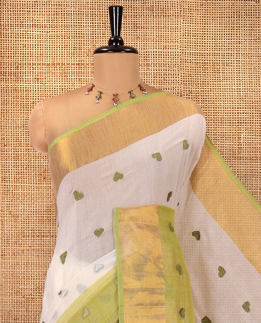 Cream and Pista Green Khadi Mul Cotton Saree, Adorned with Half-And-Half-Style and Heart Motifs Embroidery on Its Body, a Subtle Gold Zari Border, a Self-Pallu, and Has No Blouse