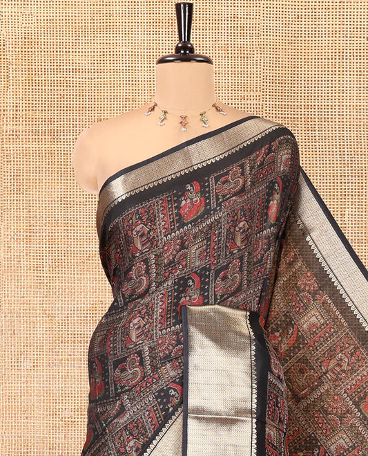Black Dola Silk Saree Features Kalamkari Peacock-Human Print, a Traditional Zari Border, Printed Pallu, and a Matching Blouse