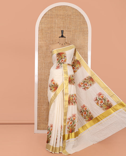 Cream Kerala Cotton Saree, Accentuated with Checks and Floral Zari Buttas, a Zari Border, a Self-Pallu and a Matching Blouse