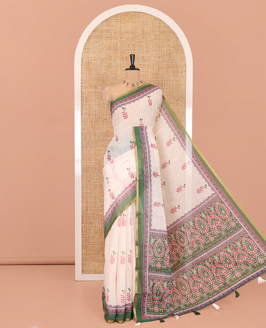 Cream-Green Linen Cotton Saree Features Floral Buttas, Contrast Printed Border, Intricate Pallu, and a Contrast Blouse