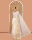 Cream Plain Chanderi Cotton Saree, Highlighted by Floral Motifs Border, a Self-Pallu, and a Matching Blouse