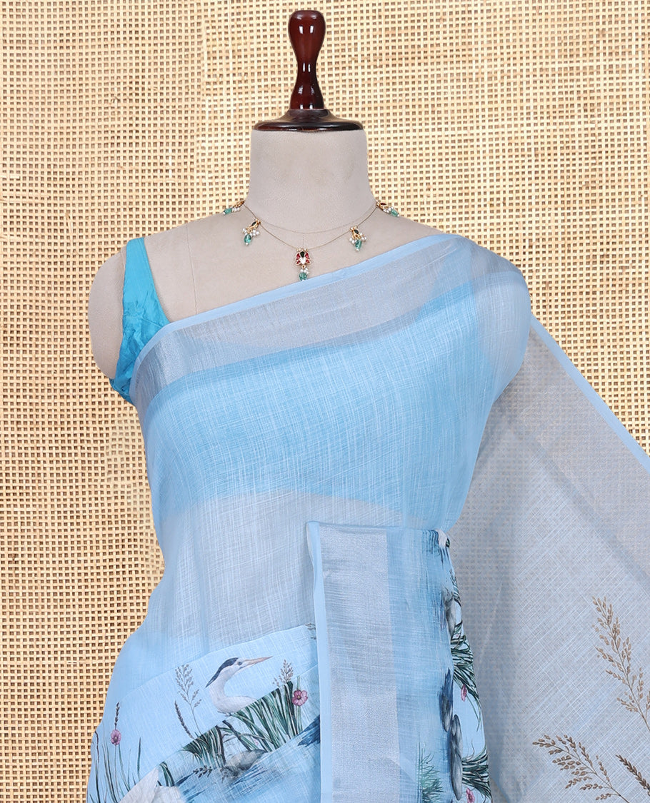 Blue Linen Cotton Saree, Accentuated with a Bird Print, a Subtle Zari Border, and a Matching Blouse