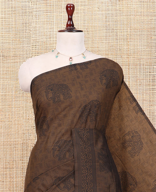 Brown South Cotton Saree Features Leaf and Elephant Motifs Print, a Subtle Printed Border, and a Matching Blouse