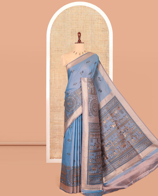 Blue Satin Silk Saree, Adorned with Warli Motif Print, Highlighted by Warli Printed Zari Border, Warli-Village Palllu, and a Matching Blouse