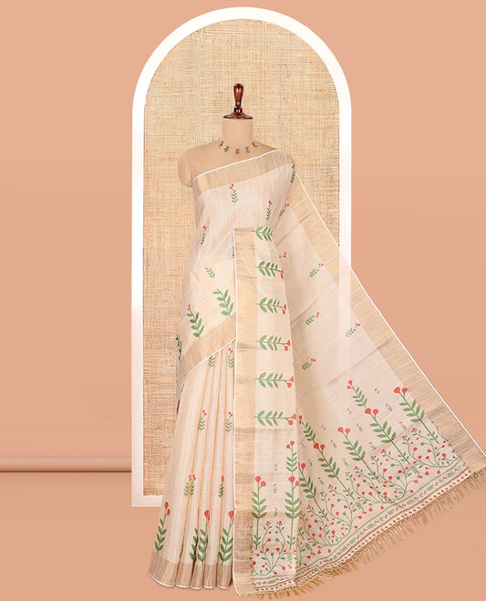 Cream-Red Tissue Linen Cotton Saree Features Floral Buttas, a Zari Border, Floral Pallu, Matching Blouse
