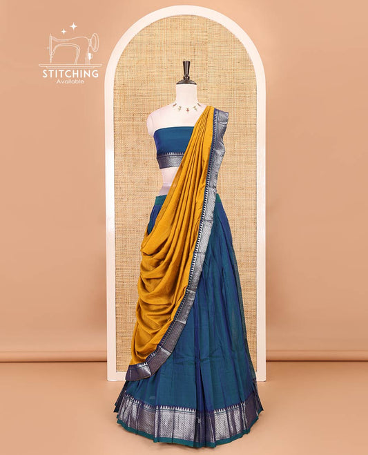 Royal blue Mercerised cotton half-saree, plain & contrast mayil kann temple border skirt, matching blouse & contrast zari border syska georgette dhavani