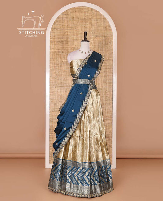 Gold banaras half saree, ogee skirt, contrast peacock blue traditional zari border, matching blouse, and Syska georgette embroidered dhavani