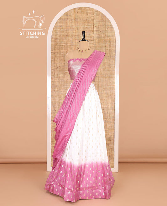 White-onion pink half-saree, zari buttas with contrast bordered nylon viscose crepe skirt, a jaal jacquard design Vichitra silk blouse, and a contrast striped Vichitra silk dhavani