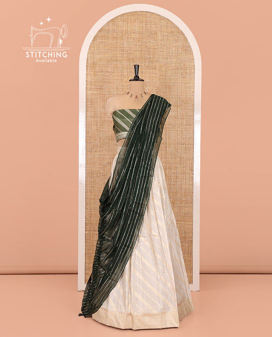 Cream-Green Semi-Banarasi Half-Saree Features Leheriya Striped Skirt, Contrast Leheriya Striped Blouse, Georgette Striped Dhavani