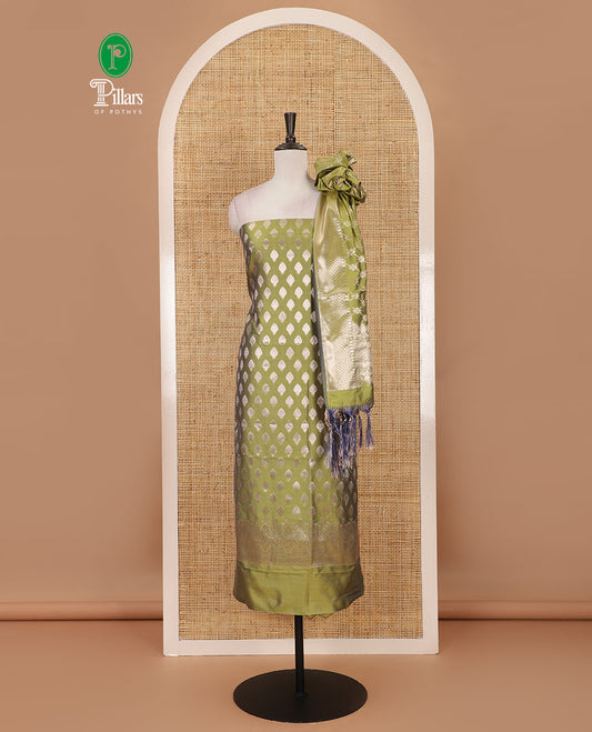 Green banarasi material chudidar set set, gold zari buttas woven top, plain bottom, and zari-rich jaal taffeta silk dupatta