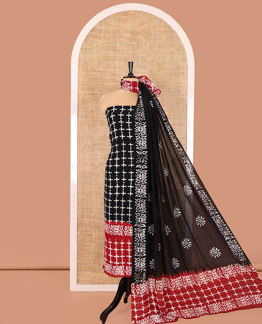 Black and Red Material Chudidhar Set, Accentuated with with Batik-Style Printed Viscose Georgette Top, Rayon Batik Printed Bottom, and Viscose Georgette Dupatta of Batik Print