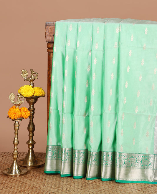 Parrot green zari butta semi soft silk saree with kodi, bhavanji border & grand pallu along with plain blouse