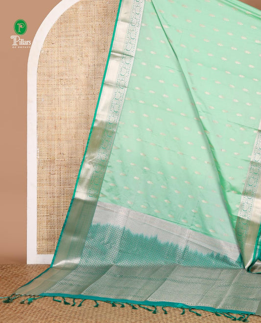 Parrot green zari butta semi soft silk saree with kodi, bhavanji border & grand pallu along with plain blouse