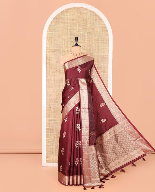 Wine Semi-Banaras Satin Silk Saree, Prettified with Floral Zari Buttas Across Its Body, Highlighted by Traditional Zari Design Border, Grand Zari Woven Palu of Jaal Designs, and Paired with a Matching Blouse