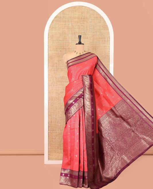 Rani Pink Litchi Saree Features Buttas and Checks, Contrast Traditional Peacock Border, Intricate Pallu, and a Contrast Blouse