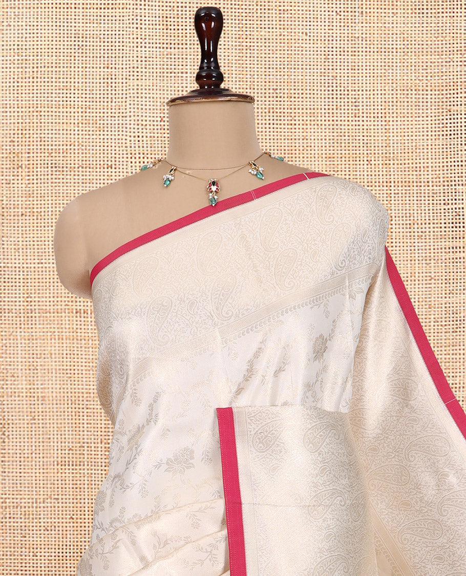 Off-White-Maroon Semi-Silk Saree, Adorned with Floral Jacquard Design, a Zari Paisley Border, and a Contrast Blouse