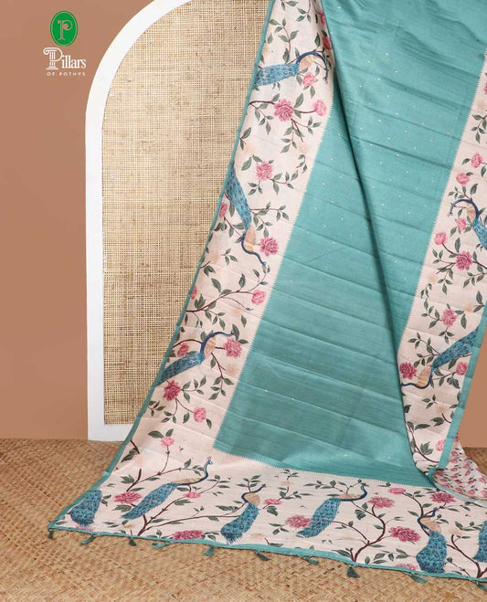 Green zari butta fancy tussar saree with peacock digital floral design border & digital print pallu along with floral print blouse