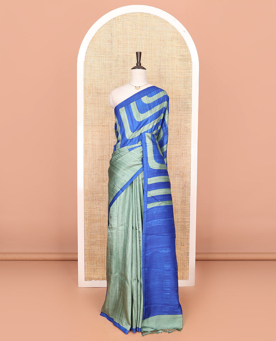 Grey plain and geometric patterns printed saree, contrast plain border, and plain pallu