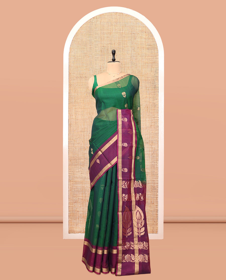 Green Silk Cotton Saree, Crafted with Floral Buttas, a Contrast Floral Motif Border, Intricate Pallu, and a Contrast Blouse