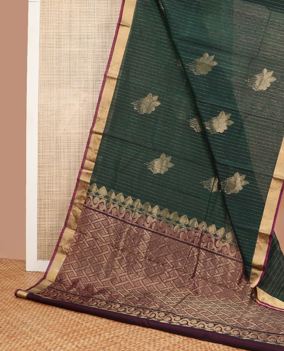 Dark green striped, floral motifs silk cotton saree with contrast zari border & checked floral design pallu