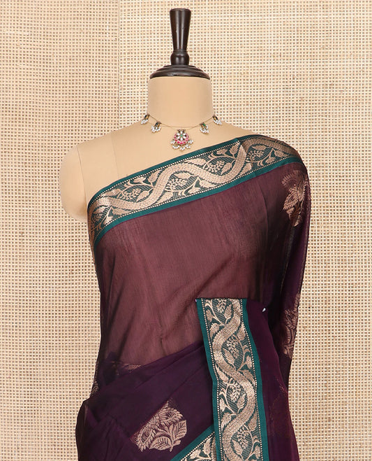 Purple Silk Cotton Saree Delicately Woven with Floral Buttas All Over the Body, Highlighted with Contrast Zari Floral Creeper Border, Pallu Elevated with Geometric Design, and Paired with a Contrast Blouse