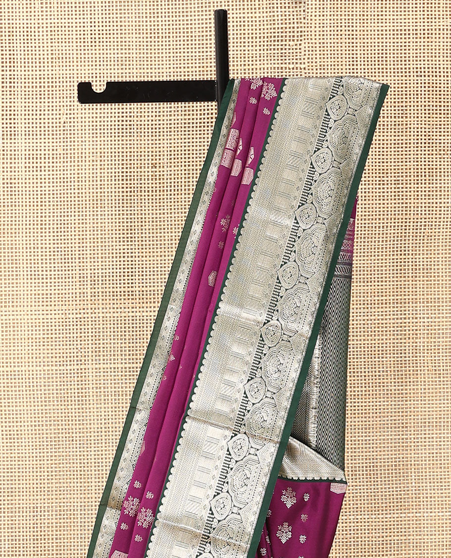 Purple geometric buttas soft silk saree, contrast traditional zari design border, and pallu of chevron designs