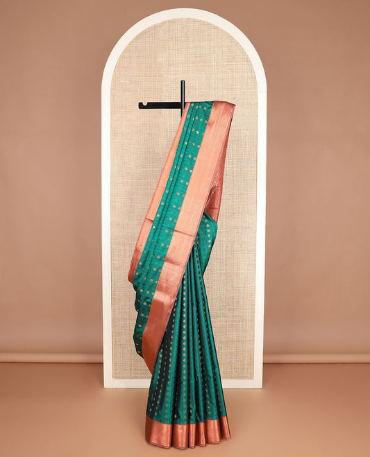 Green butta enclosed embossed checked soft silk saree, contrast traditional zari border, and jaal pallu
