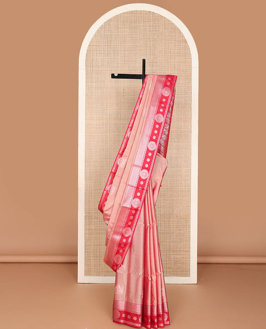 Peach semi-soft silk saree with zari buttas, contrast zari border & pallu steeped with spiral motifs