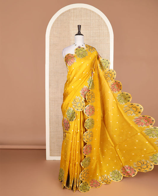 Yellow Matka silk saree features rudraksham motifs, scallop floral motifs and bird embossed thread embroidery border