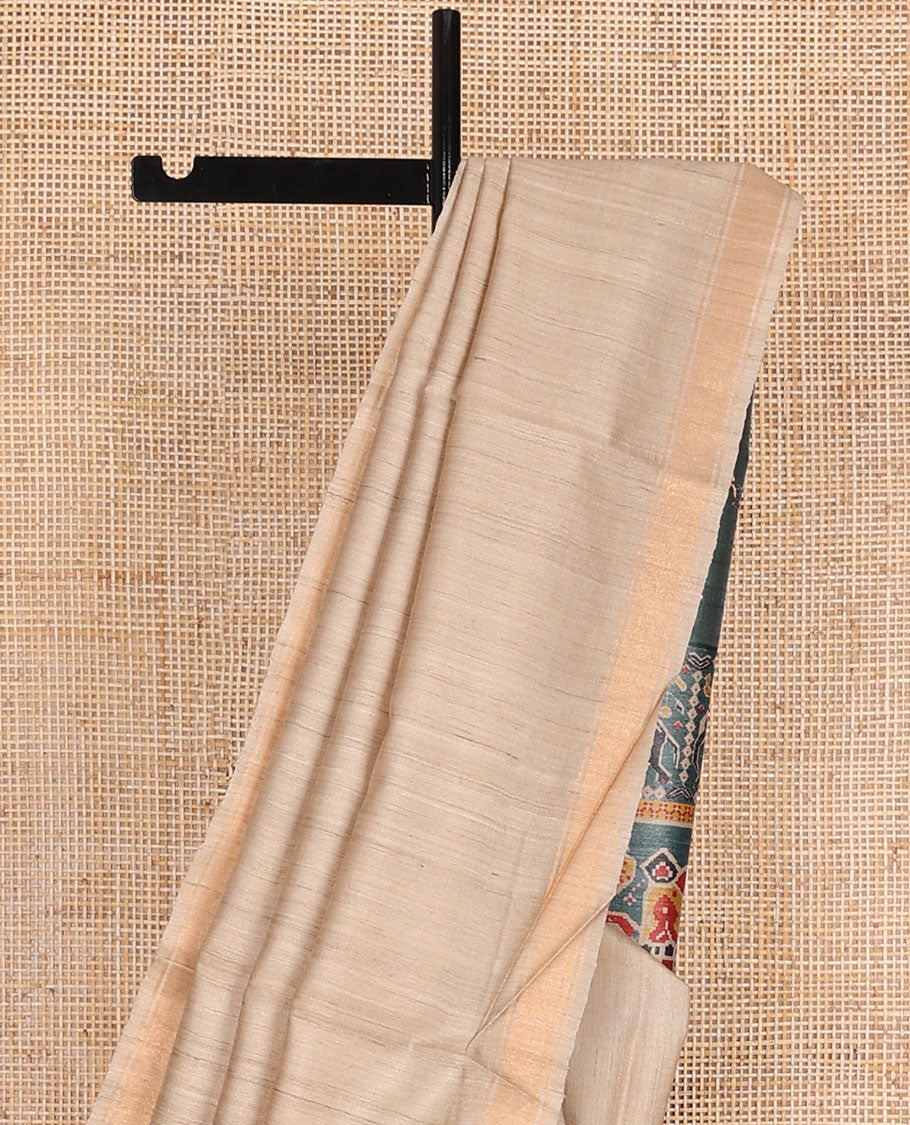Sandal plain design tussar saree, zari border & contrast pallu of patola-style elephant motifs print