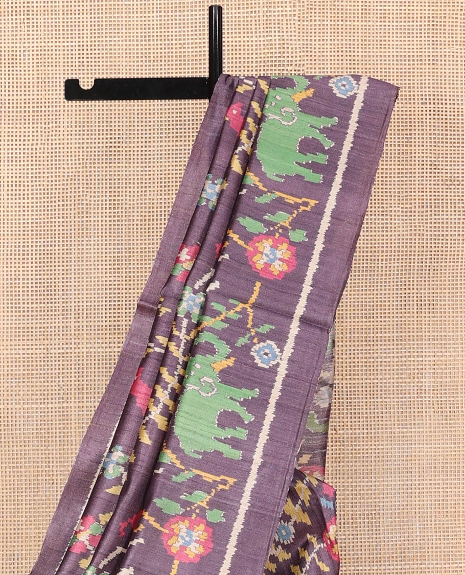 Grey Tussar Silk Saree, Impeccably Styled with Ikat-Style Flora, Fauna, and Human Figurines, a Subtle Self-Border, Self-Printed Pallu, and a Matching Blouse