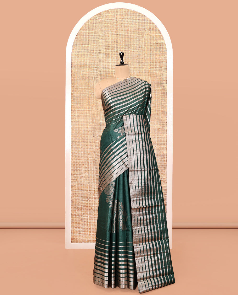 Borderless Green Tussar Silk Saree, Impeccably Styled with Zari Stripes and Floral Buttas, Striped Pallu, and a Matching Blouse