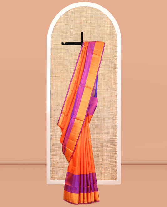 Orange Uppada Silk Saree, Accentuated with Polka Dot Buttas, Complemented by Contrast Bavanji Border, Pallu of Polka Dot Buttas and a Contrast Blouse