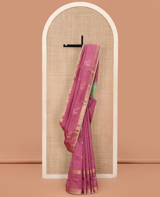 Onion Pink Uppada Silk Saree Elevated with Floral Buttas, Captivating Contrast Border of Traditional Zari Motifs and Peacock Motifs, Pallu Depicting Floral Jaal Design, and Paired with a Contrast Zari-Bordered Blouse