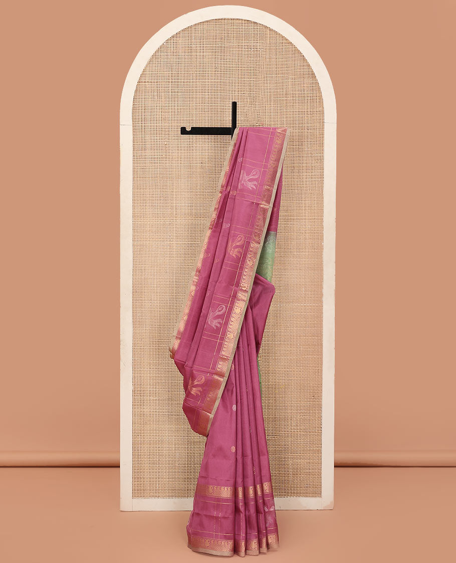 Onion Pink Uppada Silk Saree Elevated with Floral Buttas, Captivating Contrast Border of Traditional Zari Motifs and Peacock Motifs, Pallu Depicting Floral Jaal Design, and Paired with a Contrast Zari-Bordered Blouse