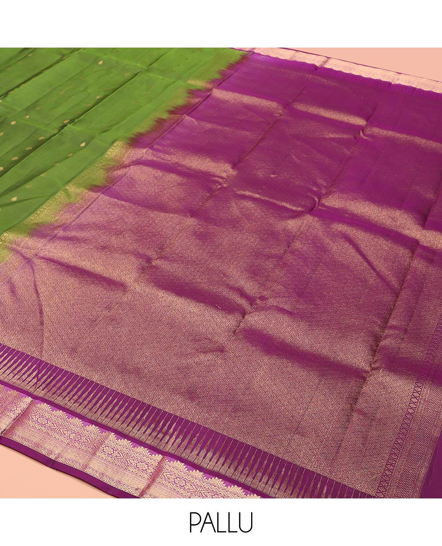 Green Vasundhara Lite-Silk Mix Saree Embellished with Zari Buttas on Its Body, Complemented by a Contrast Border of Thazampoo Rekku, Rettai Neli, Jada Nagam, and Mayil Kann Designs, Gleaming Zari Pallu of Jaal Designs, and Paired with a Contrast Blouse