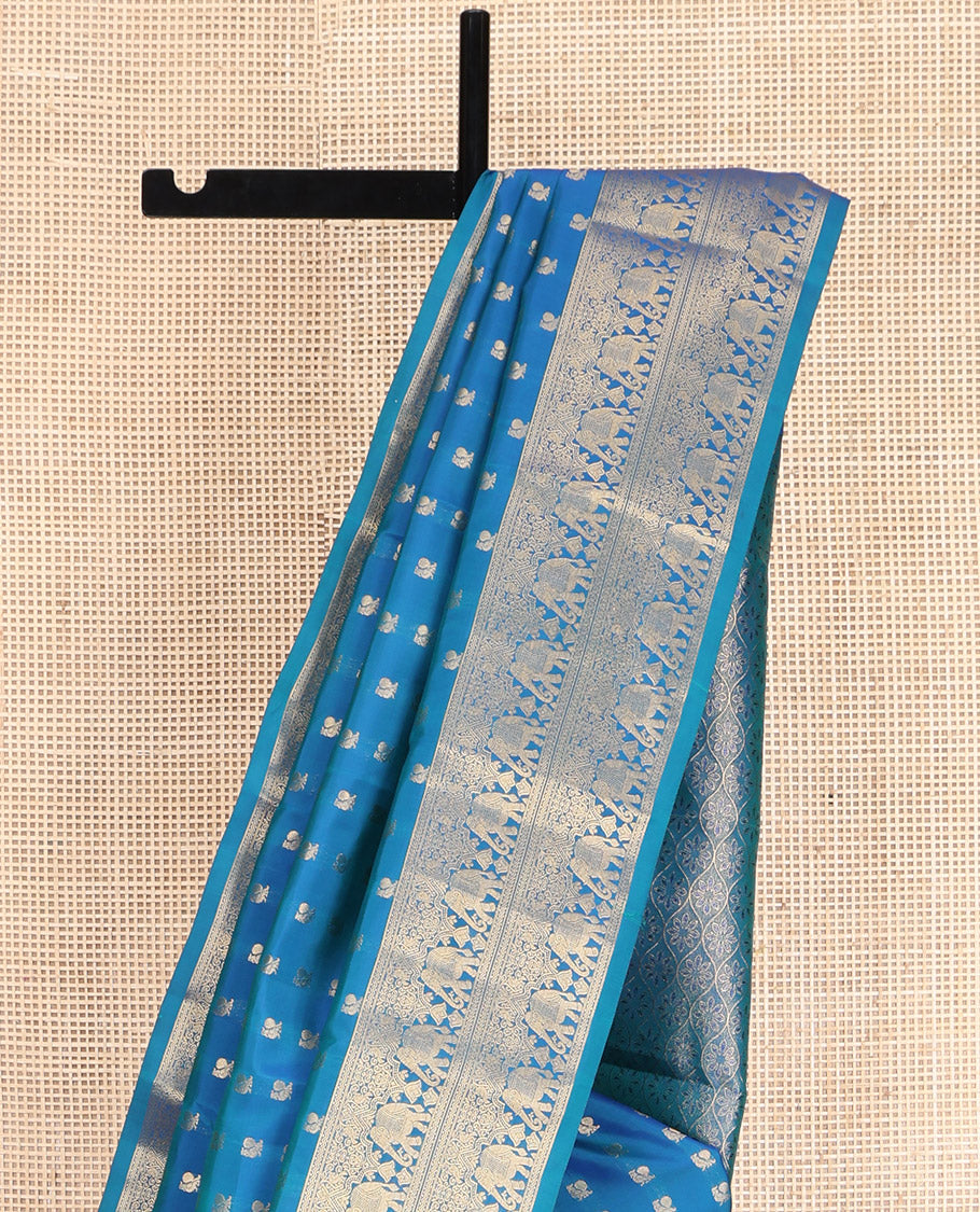 Blue Vasundhara Lite-Silk Mix Saree, Artfully Woven with Mayil Buttas, Highlighted by Zari Border of Rettai Neli, and Yaanai Designs, Grand Ogee Patterned Pallu, and Paired with a Matching Blouse