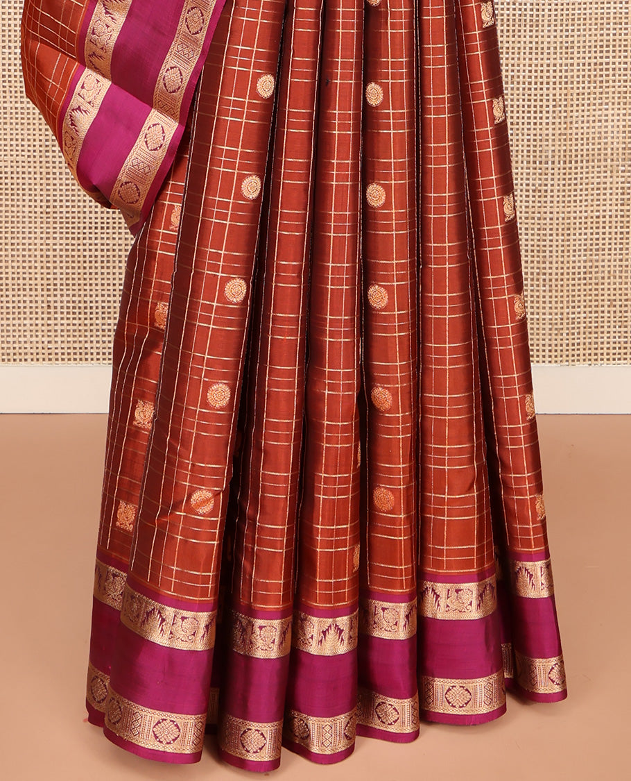 Orange Vasundhara Lite Silk Mix Saree, Enriched with Mayil-Chakram Butta Enclosed Checks, Complemented by Contrast Rettai Pettu Border of Mayil, Thazampoo Rekku, and Laddu Kamalam Designs, Geometric Patterned Pallu, and Paired with a Contrast Blouse