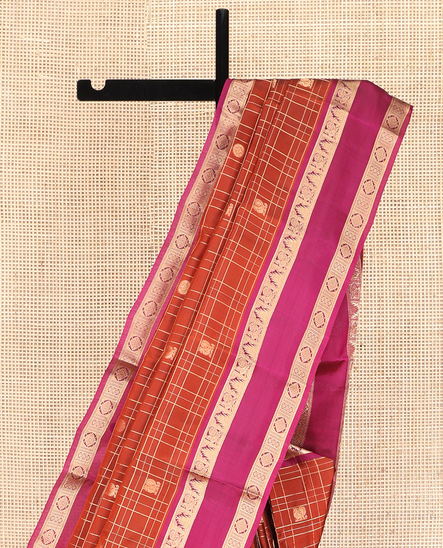 Orange Vasundhara Lite Silk Mix Saree, Enriched with Mayil-Chakram Butta Enclosed Checks, Complemented by Contrast Rettai Pettu Border of Mayil, Thazampoo Rekku, and Laddu Kamalam Designs, Geometric Patterned Pallu, and Paired with a Contrast Blouse