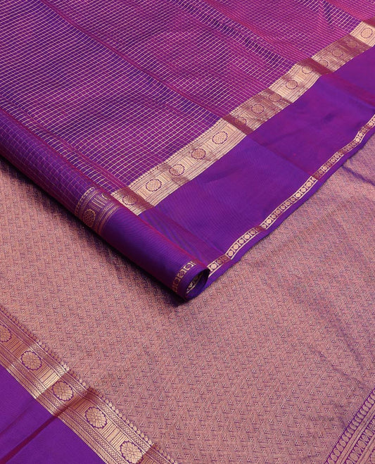 Purple zari checked Vasundhara silk mix saree, zari rettai pettu border of manga, muthu, banaras, and laddu kamalam designs, and intricate pallu