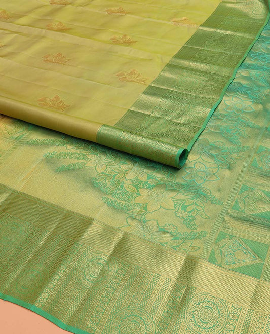 Green Vasundhara Lite Silk Mix Saree Elevated with Floral Zari Buttas, Complemented with a Contrast Border Featuring Chakram and Geometric Designs, Pallu Adorned with the Floral Designs, and Paired with a Contrast Blouse